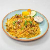 Chicken Biryani · Spiced chicken with Saffron flavor Basmati rice mildly spicy with traditional spice
