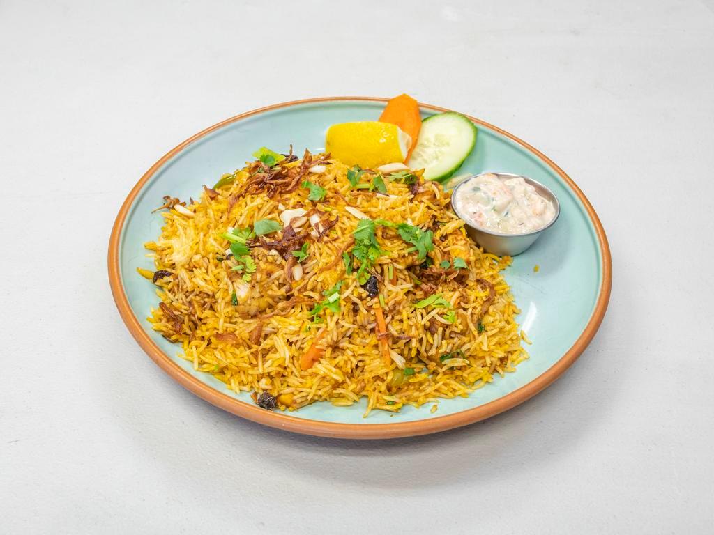 Chicken Biryani · Spiced chicken with Saffron flavor Basmati rice mildly spicy with traditional spice