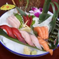 Sushi Sashimi Combo · 5 pieces of sushi, 9 pieces of sashimi and a tuna roll.
