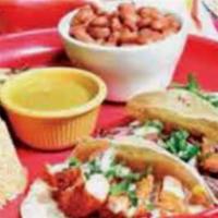 Tacos Authenticos · 3 tacos made with corn tortillas, charbroiled steak or chicken, finished with white onions, ...