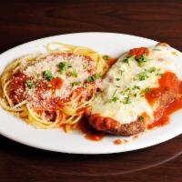 Chicken Parmigiana · Served with penne, house salad and garlic bread.