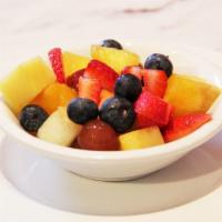 FRESH FRUIT · Seasonal berries and melons cut daily.