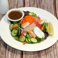 Seafood Salad (J) · Tuna, salmon, white fish and cucumber on gourmet spring mix with mustard dressing.