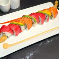 Hula Hula Roll · Shrimp tempura and crab inside topped with tuna, avocado, salmon and mango.