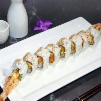 Spider Roll · Deep-fried soft shell crab, avocado, masago, cucumber and radish sprouts.