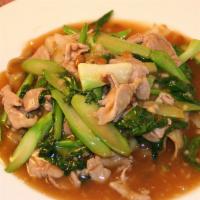 Rad-Na Noodles · Pan fried flat rice noodles topped with Chinese broccoli, meat and gravy sauce.