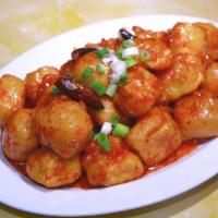 A19. Orange Tofu · Battered deep-fried tofu with special sweet, tangy sauce and green onion.