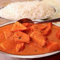 Chicken Makhani Specialty (halal) · Boneless tandoori cooked in appetizing tomato and butter sauce with crushed cashews.
