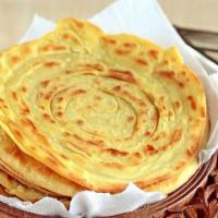 Lacha Paratha · Multi-layered whole wheat flour bread cooked with vegetable oil.
