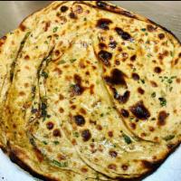 Pudina Paratha · Multi-layered whole wheat flour bread cooked with pudina and vegetable oil.
