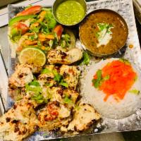Oriental Malai Chicken Tikka Special(halal) · Boneless cubes of chicken marinated in a mildly spiced creamy cashew nut paste and char-gril...