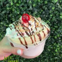Classic Banana Split Bowl · Vanilla & chocolate ice cream, strawberries, bananas, nuts, whipped cream with a cherry on t...