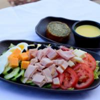 Chef Salad · Ham, turkey, hard-boiled egg, cheddar, mozzarella, romaine, tomato, cucumber, black olive, g...