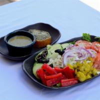 Greek Salad · Feta cheese, romaine, tomato, cucumber, red onion, red bell pepper, black olive, pepperoncin...