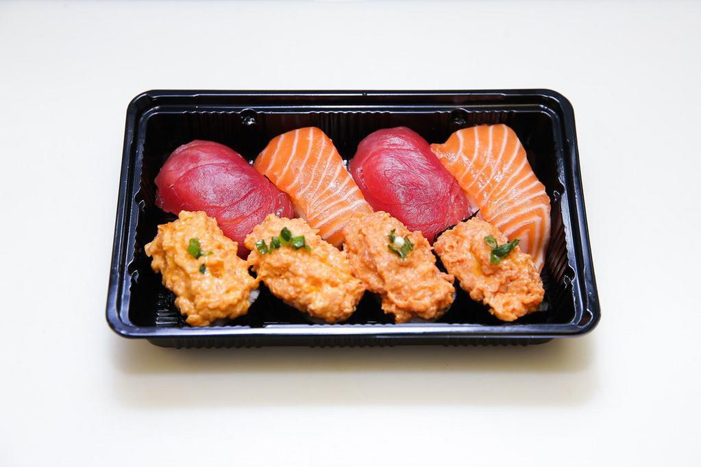 Bento 1 · Ahi nigiri 2 pieces, salmon nigiri 2 pieces, spicy ahi nigiri 2 pieces, and spicy salmon nigiri 2 pieces.