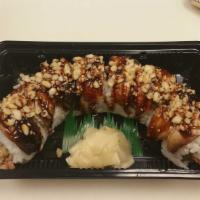 Unagi Maki · Shrimp tempura roll, unagi, unagi sauce, and tempura flakes.