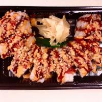 Ahi Lovers Special · Shrimp tempura roll, spicy ahi, special sauce, and tempura flakes.