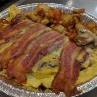 Bacon Omelette Breakfast · 3 egg omelette with bacon. Served with home fries and toast.