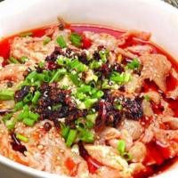 Thin Slice Beef in Spicy Chili Soup 水煮肥牛 · Thin cut beef slices in chili broth (come with rice)