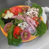 Antipasto Salad · Lettuce, green and red peppers, tomatoes, olives, red onions, cauliflower, feta cheese, arti...