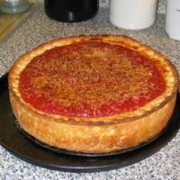 Meat Lovers Pizza · Tomato sauce, mozzarella cheese, pepperoni, Italian sausage, ham, bacon and ground beef. 