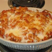 Baked Ziti · Comes with three garlic rolls and small side salad.
