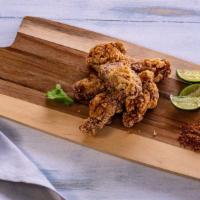 Mitsuba Chicken Wings · Light flour coating chicken wings, fried and tossed with delicious Mitsuba 7 spices. 