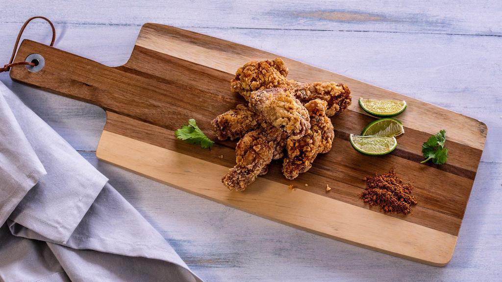 Mitsuba Chicken Wings · Light flour coating chicken wings, fried and tossed with delicious Mitsuba 7 spices. 
