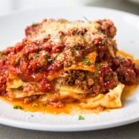 Lasagna Classica · Layers of fresh pasta, Ragu Bolognese, bechamel and topped with marinara sauce.
