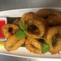 8. Fried Calamari · Fresh squid, lightly battered and deep fried, served with sweet and sour sauce.