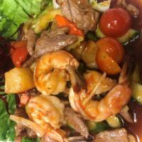 42. Sweet Melody Lunch · Sauteed jumbo shrimp and pork with fresh pineapple, tomato, cucumber, sweet peppers and onio...
