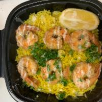 Jumbo shrimp meal · With rice, salad, pita bread, hummus