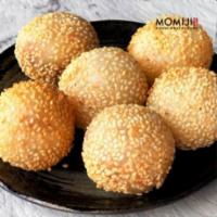 Sesame Balls · 6 pieces of deep-fried Japanese pastry, filled with red bean paste and coated with sesame se...