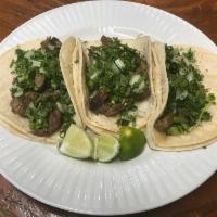 Suadero Taco · Beef brisket. Comes w cilantro & onions 