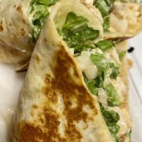Grilled Chicken Caesar Wrap · Grilled chicken, romaine, Parmesan and Caesar dressing. French fries substitution available ...