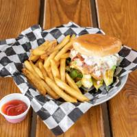 Grilled Chicken Avocado Sandwich · Club style sandwich with juicy grilled chicken with melty Swiss cheese served on a toasted b...