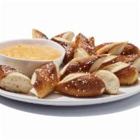Beer Cheese ＆ Pretzels · Creamy cheese gets a shot of stout beer, and is served up with salted Bavarian pretzels. It’...