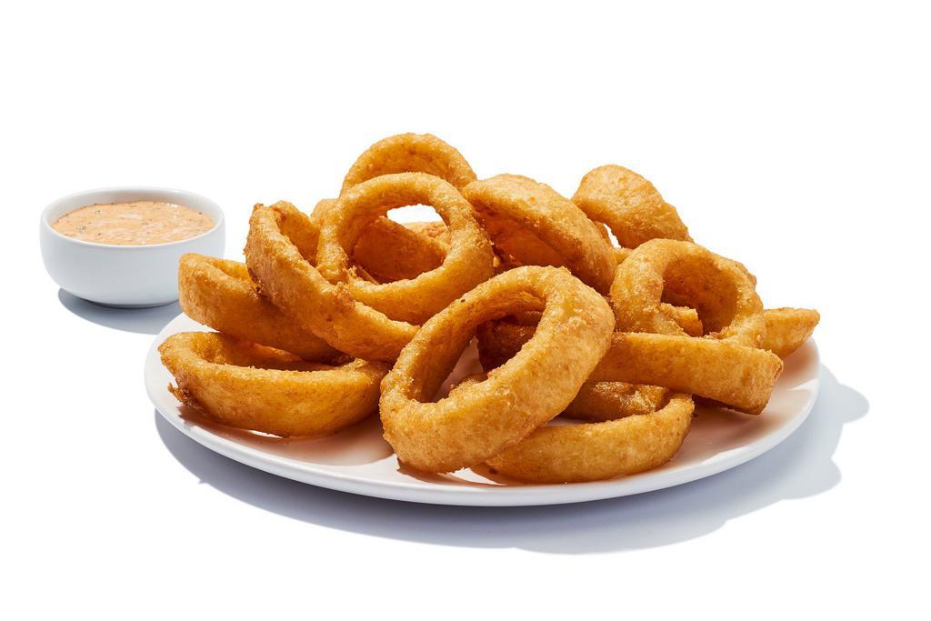 Onion Ring Basket · Sweet onions, breaded and fried, piled high and served with a tangy dipping sauce. 