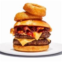 Western BBQ Burger · It’s like a burger with spurs. BBQ sauce, melted cheddar, bacon and onion rings all wrangled...