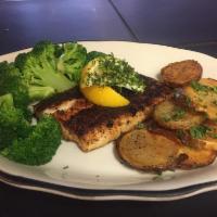 Fish Dinner · Our house fish grilled or blackened, served with a side of vegetables and roasted potatoes.