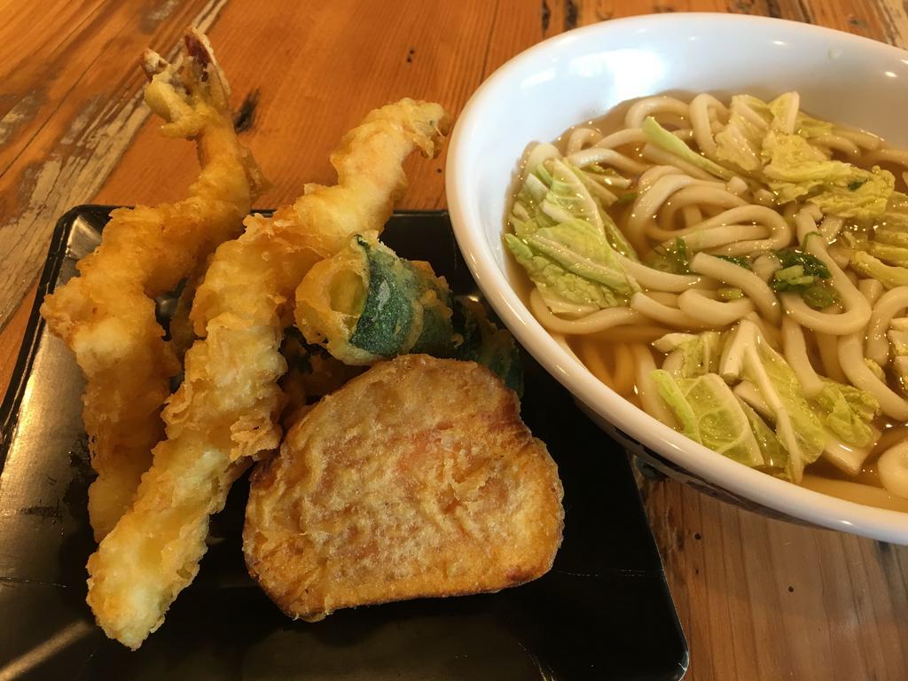 Shrimp and Vegetable Tempura Udon Noodle Soup · Savory broth with thick wheat noodles.