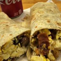 Hash Brown Burrito · 2 Eggs, Sausage, Bacon, Hash Brown, Cheese and Sour Cream