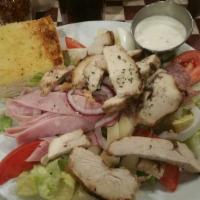 Italian Chef Salad · Crisp Lettuce, salami, smoked ham, provolone cheese, tomato, hard-boiled egg, red onion and ...