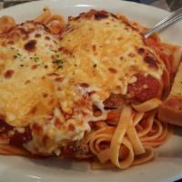 Veal Parmesan · Tender hand breaded veal cutlets topped with marinara sauce, mozzarella and Parmesan cheeses...