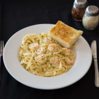 Fettuccine Alfredo · Fettuccine noodles tossed in our house made Alfredo sauce.