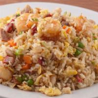 Combination Fried Rice · Chicken, BBQ pork and shrimp. Steamed rice stir fried with eggs, peas, carrots and green oni...