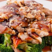 Teriyaki Chicken · Grilled chicken over steamed vegetables topped with house teriyaki sauce. Served with rice.