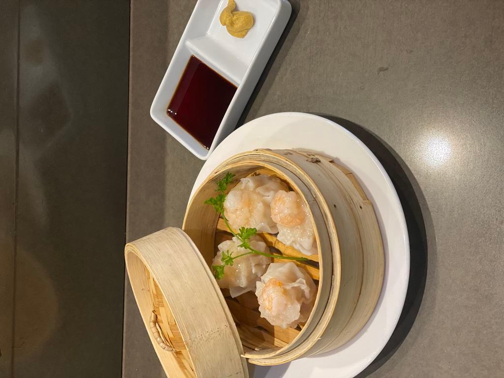 Shrimp Dumpling · 4 pieces. Steamed shrimp dumpling served with special soy sauce and mustard.