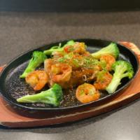 Lava Shrimp · Sauteed shrimp served over deep-fried tofu with sweet chili sauce.