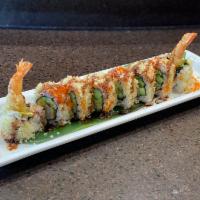 Crunchy Roll · Shrimp tempura, avocado and cucumber roll topped with smelt egg, tempura flakes, and eel sau...